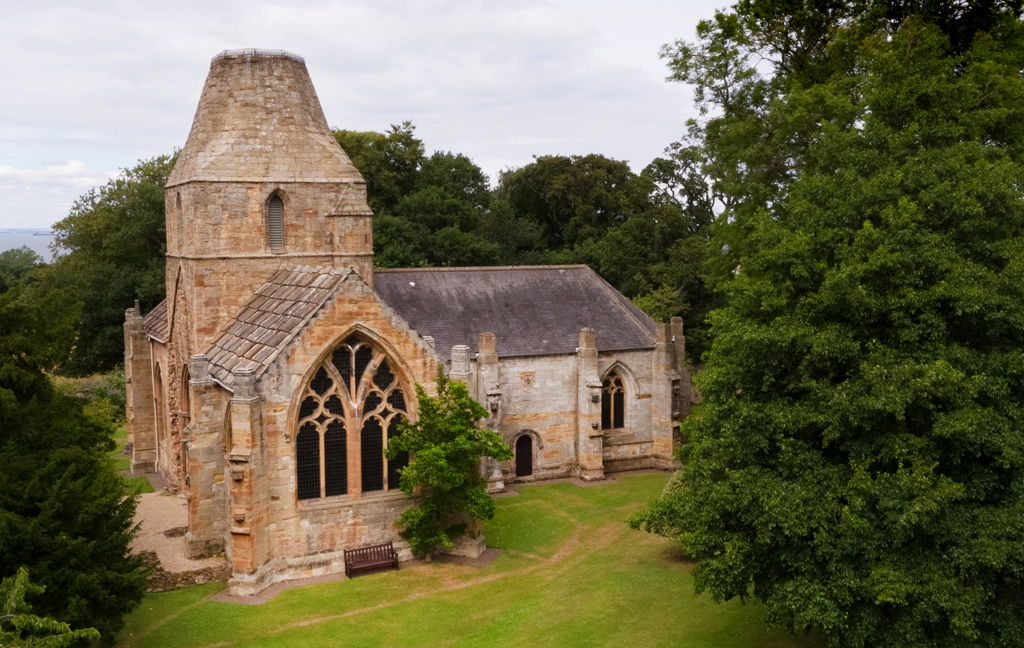 church surrounded by trees